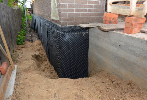 SJ Waterproofing Pros technician performing targeted Foundation Crack Repair assessment in Mound, MN